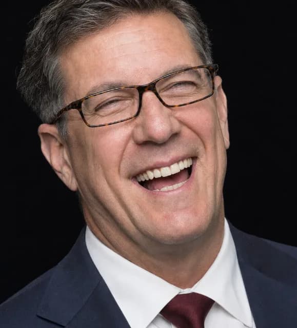 AI-generated character Paul E. Tician, laughing